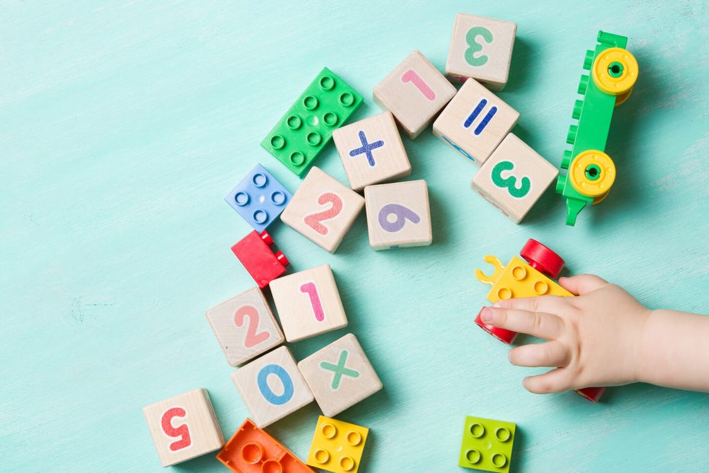 Child playing with lego and number blocks at a childcare center in Carlingford, Epping area in Sydney